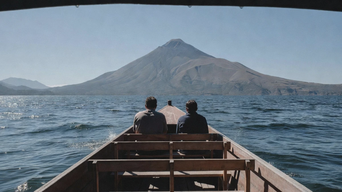 A lancha boat crossing the open water of Lake Atitlan between villages during a Lake Atitlan boat tour